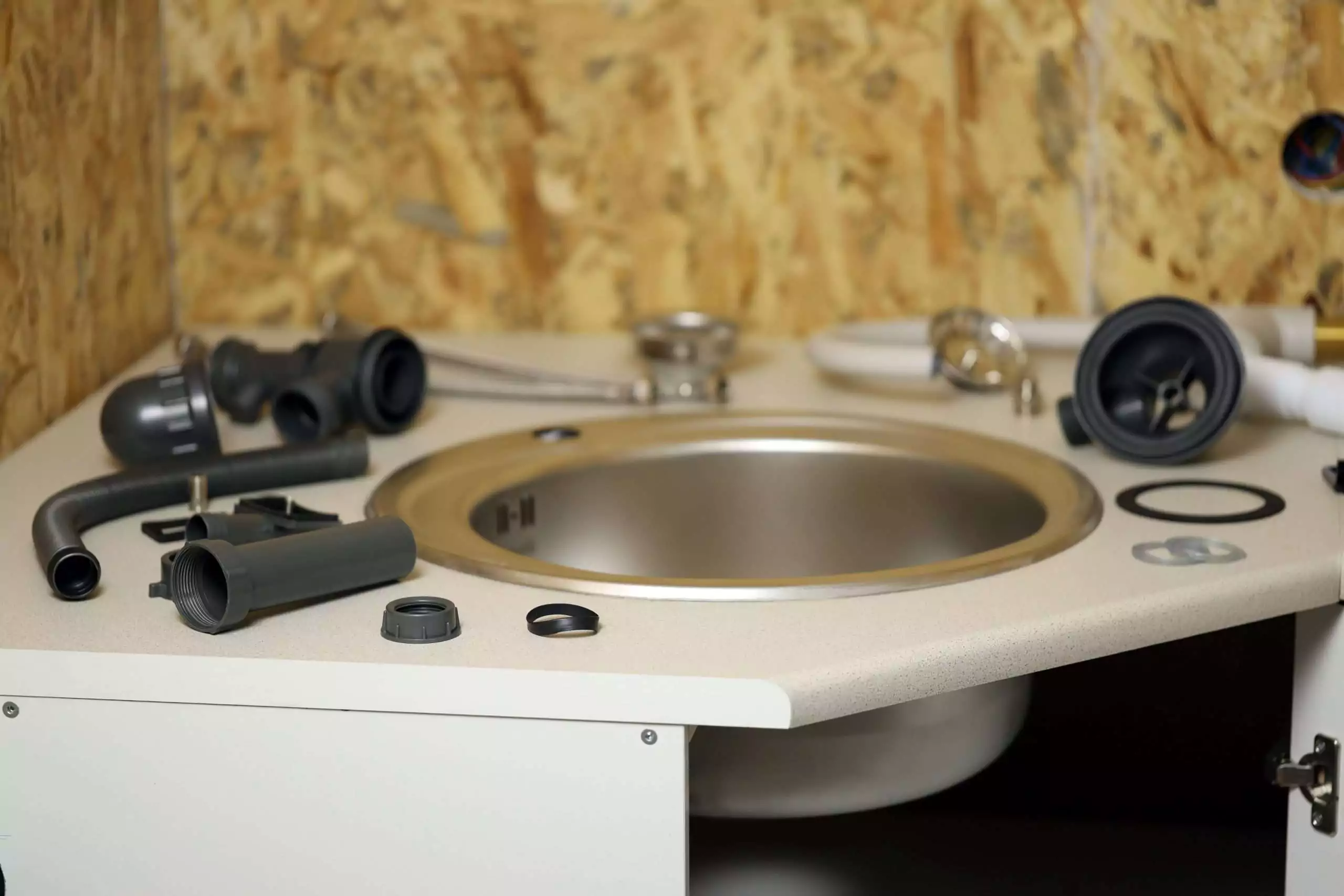 New Stainless Steel Sink with Plumbing Parts