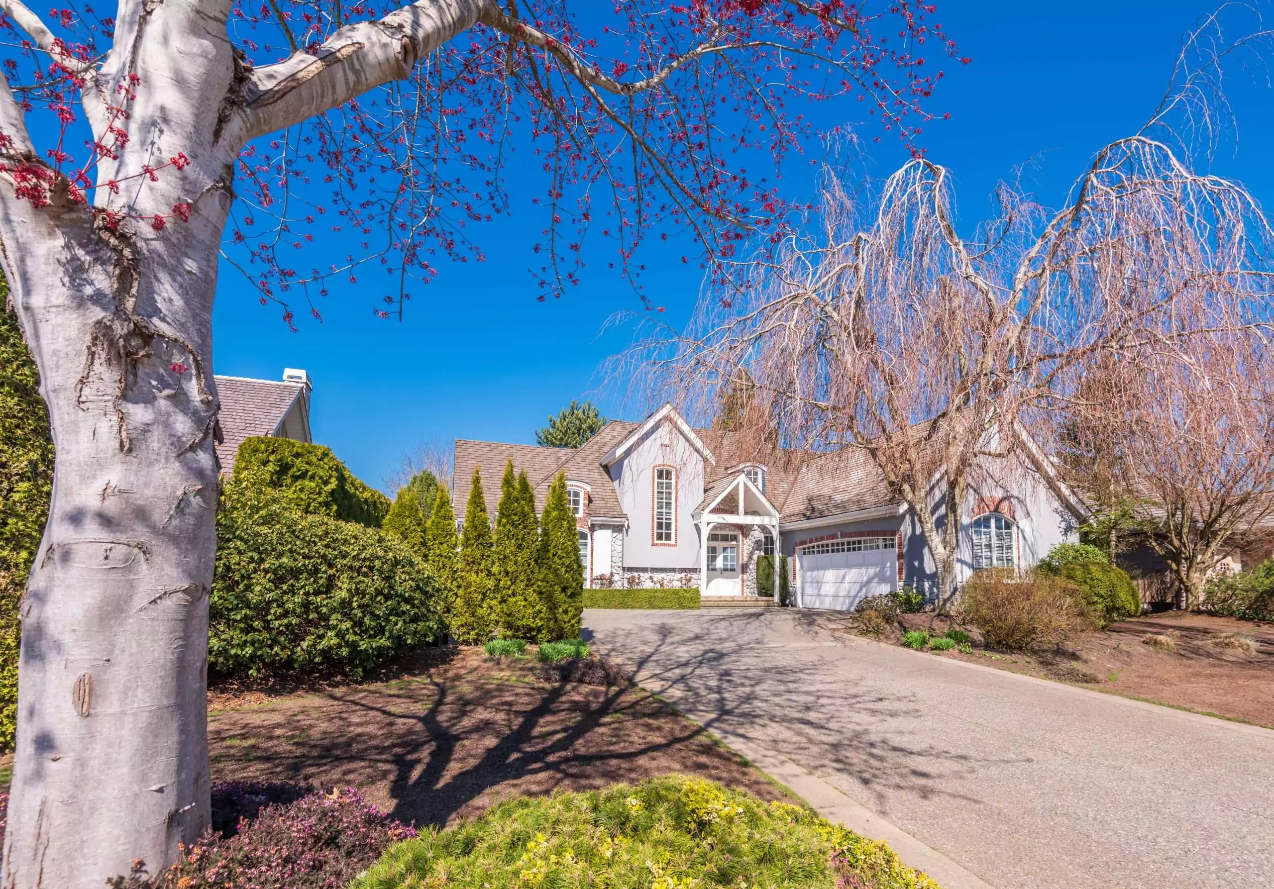 Beautiful Exterior Of Newly Built Luxury Home. Yard With Green Grass And Walkway Lead To Front