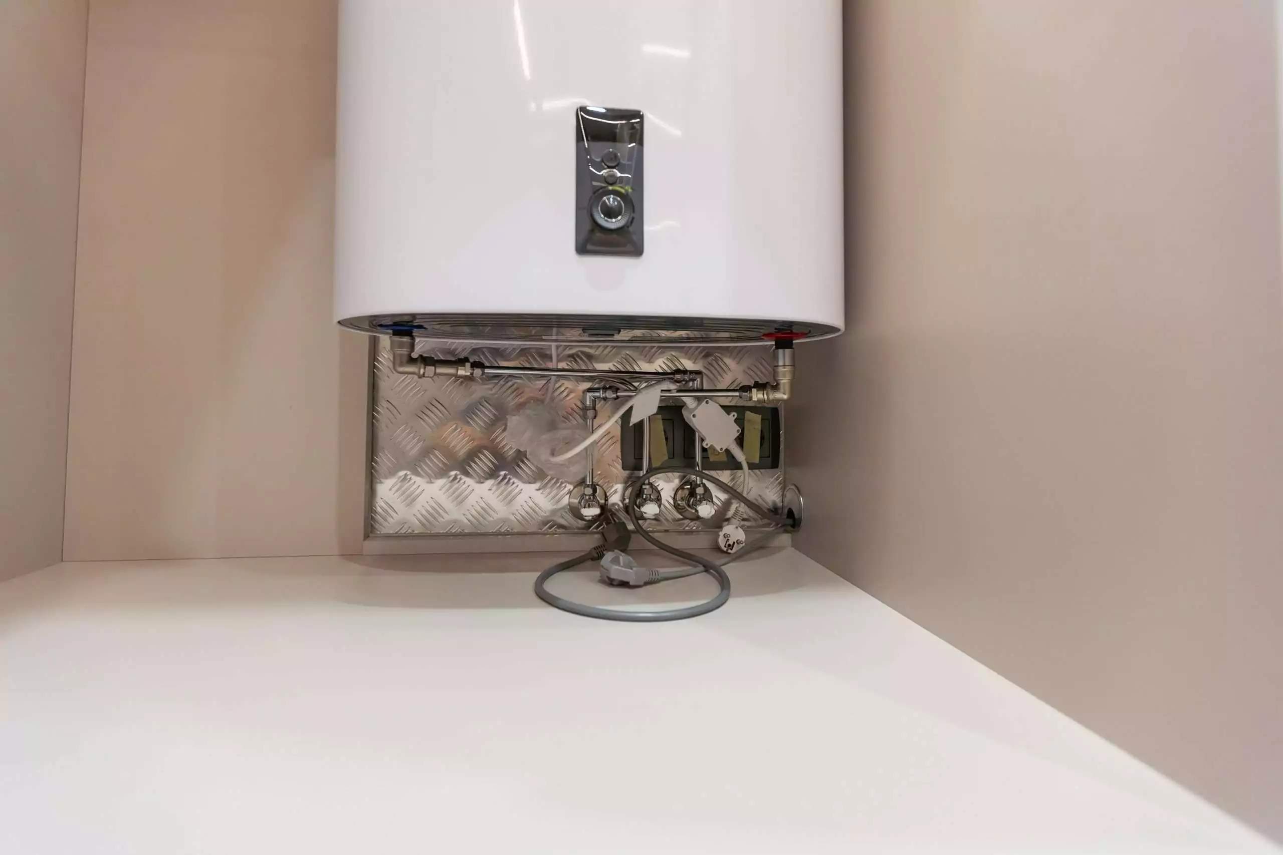 Modern Water Heater Installation in a Home Setting