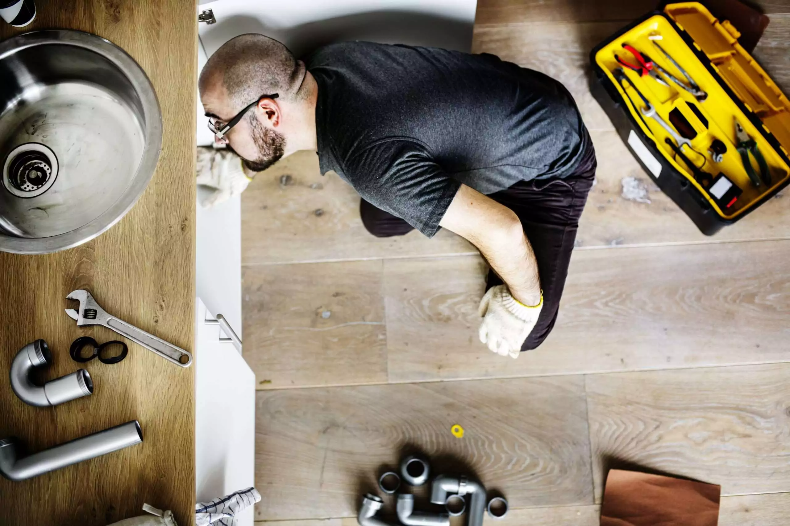 Plumber cost in Mesquite TX 2026 - James Armstrong Plumbing Master Plumber providing a written estimate to a homeowner in Mesquite, Texas